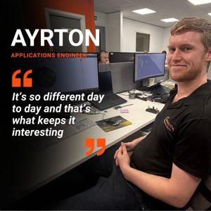 Ayrton Rogers Application Engineer sat at his desk with a quote graphic
